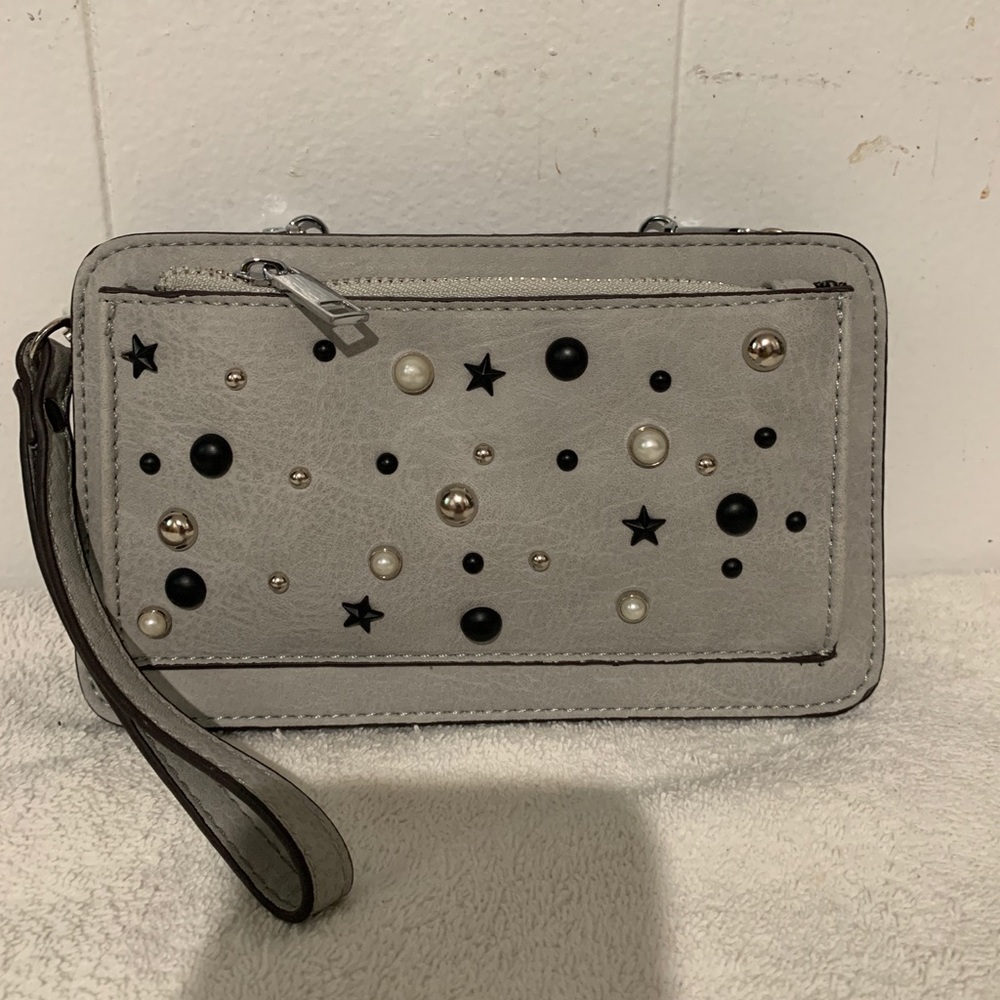 Carlos Santana crossbody and wristlet